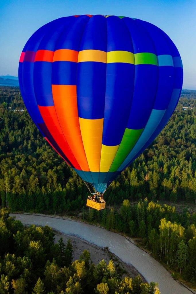 Seattle Ballooning's blue, yellow, orange, and green hot air balloon