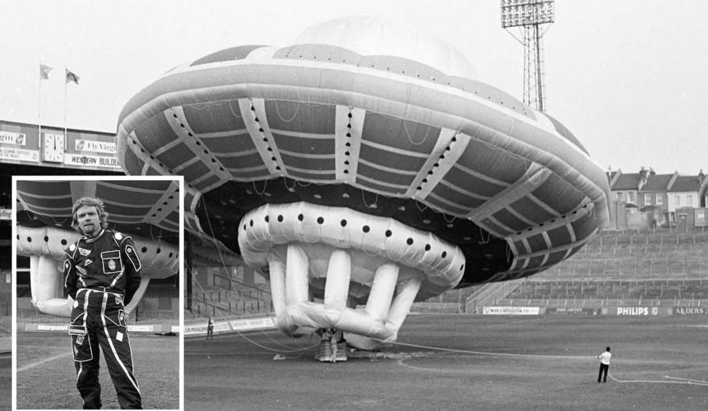 Richard branson with a ufo shaped hot air balloon